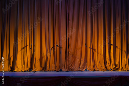 red-brown curtain on the stage with wooden floor and theater backstage, background, texture