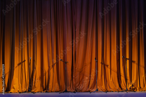 red-brown curtain on the stage with wooden floor and theater backstage, background, texture