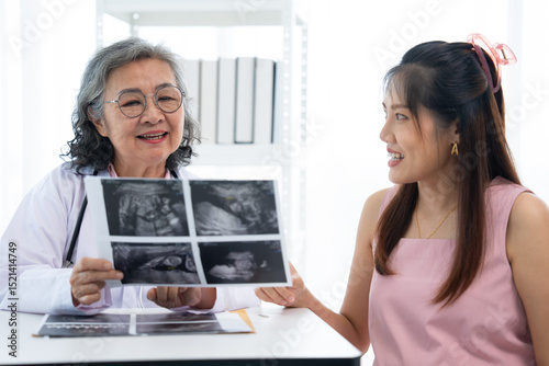 An expectant mother visits the clinic for prenatal care, a professional obstetrician. With confidence and positivity, the gynecology team conducts an ultrasound, ensuring a happy and healthy baby