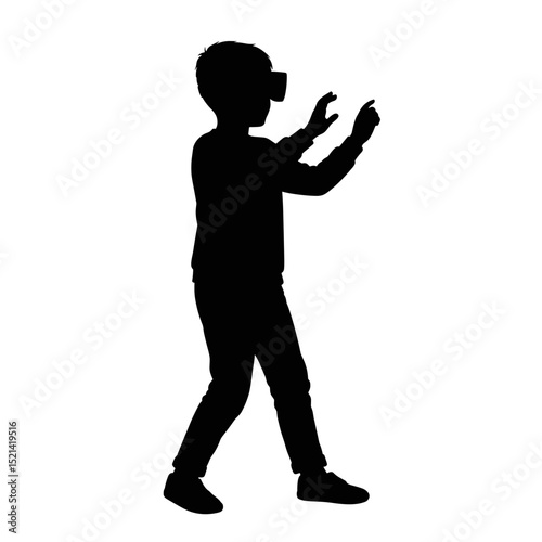 Child interacting with virtual reality in silhouette during play  