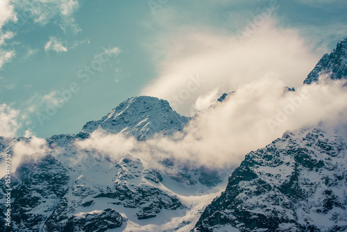 Fototapeta Naklejka Na Ścianę i Meble -  Mountain peaks near Morskie Oko Lake in Poland at Winter. Tatras range
