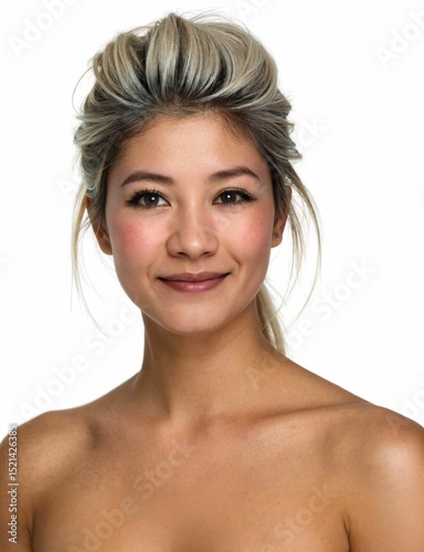 smiling woman with fair skin, blonde hair styled in a messy bun,