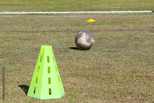 Accessories for football training on a grassroots field in Rio de Janeiro.