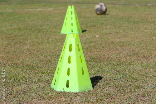Accessories for football training on a grassroots field in Rio de Janeiro.