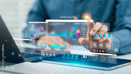 An analyst uses Data analytics automated with AI technology. Dashboard report, operations charts and KPI insights. Big Data technology, Business analysis and artificial intelligence automation.