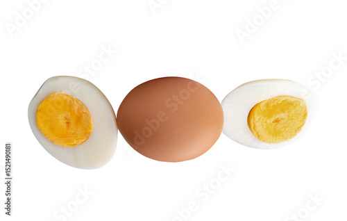 Cuadro en lienzo Top view of raw chicken egg and peeled cooked or boiled egg with egg yolk in two