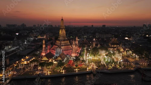Wat arun temple glowing with vibrant festival illumination, Aerial View, Bangkok, Thailand.