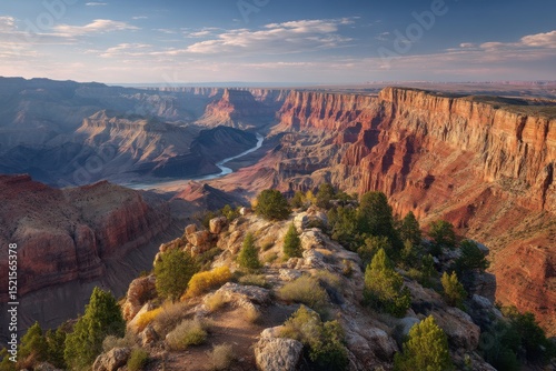 Breathtaking panoramic view of the Grand Canyon in Arizona, showcasing its majestic scale and vibrant red rock formations