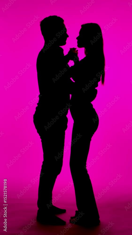 Silhouette of Couple in Romantic Red Lighting Background Silhouette of Couple in Romantic Red Lighting Background