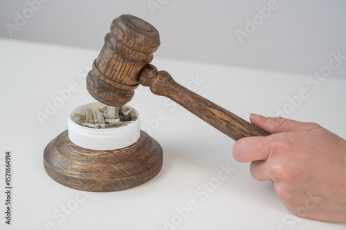 Judge Bangs Gavel. Chewing Tobacco Ban. 