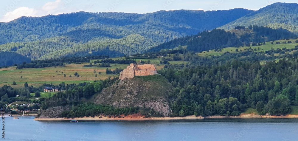 Fototapeta premium Castle in Niedzica, forest and landscape by the river with the mountains