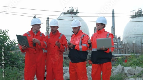 Team of Engineers Discussing Gas Plant Operations