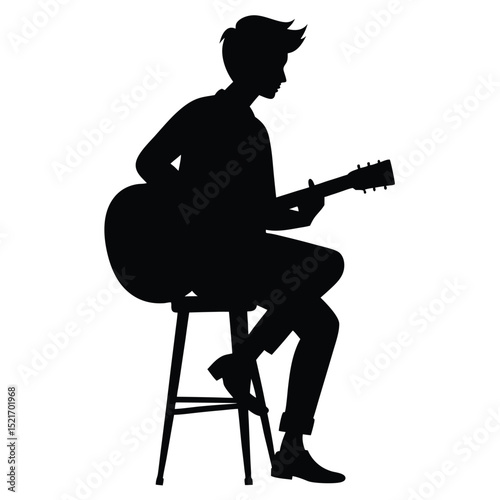 Silhouette of a Young Guitarist Sitting on a Stool and Playing Music