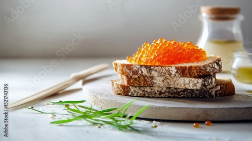 Delicious Sliced Bread Topped With Vibrant Fish Roe on a Marble Board