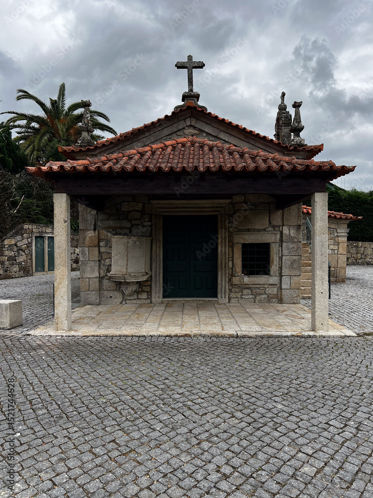Fototapeta premium old stone church exterior along the road to santiago near Ponte de Lima in portugal