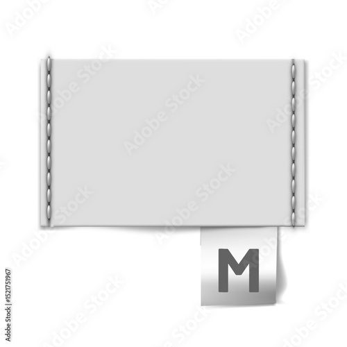 Rectangular blank textile label with stitching along the edges and letter M at the bottom.
