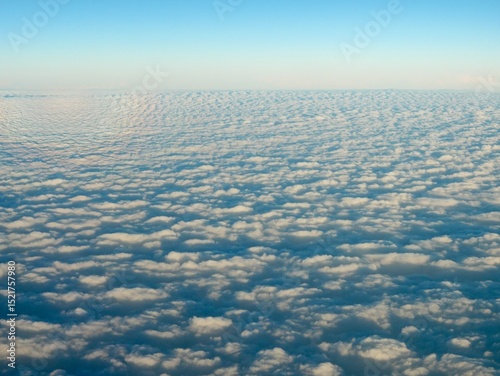 Fototapeta Naklejka Na Ścianę i Meble -  Aerial view of a sea of clouds with a circular glory in the sky
