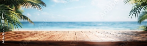 A wooden table stands ready for display against a stunning seascape. Palm leaves frame the ocean view, while soft bokeh lights create a tranquil summer vibe