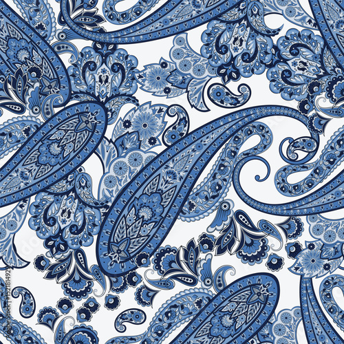 Floral seamless pattern with paisley ornament. Vector illustration in asian textile style