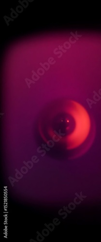 purple and red object with a black background