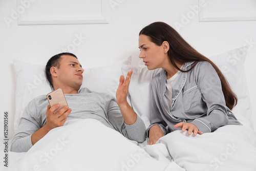 Young woman quarreling with...