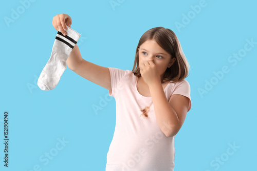 Disgusted little girl with ...