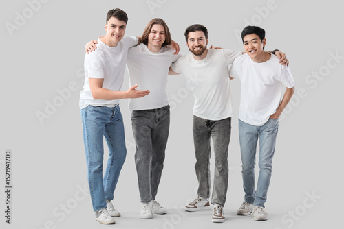 Group of young men in white...