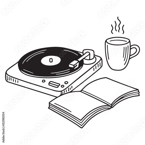 A turntable with a tea cup and notebook nearby