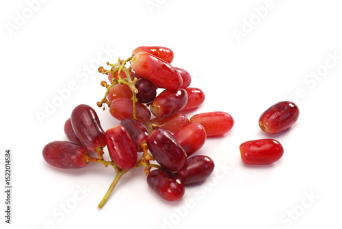 Red grape isolated on white background.