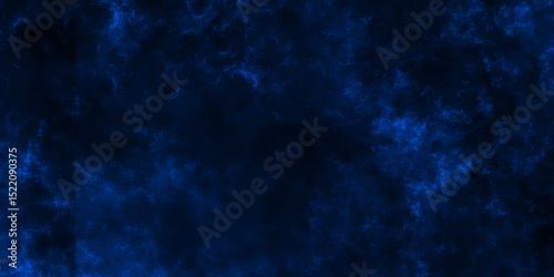 Blue smoke in dark background.Texture and desktop picture. blue texture with colorful smoke, decorative and blurry and grunge blue paper texture, Colorful blue textures for making flyer and poster.	