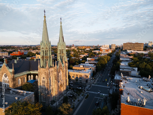 Drone flight above the Roman Catholic Saint-Edouard Church in Montreal at sunset, Quebec, Canada