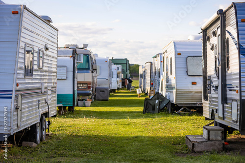 Campground with Campers on Green Field