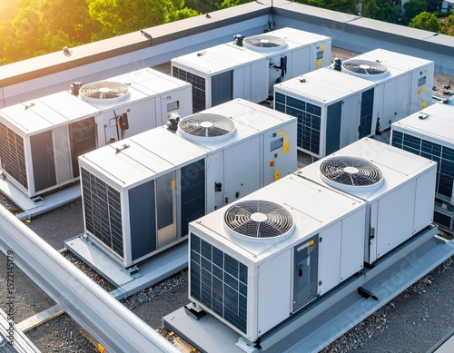 High Angle View of HVAC Systems Installed on Rooftop Showing Equipment and Clear Sky Background