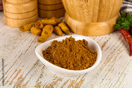 Fototapeta Naklejka Na Ścianę i Meble -  Indian cuisine - curry powder for culinary