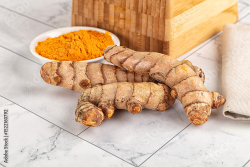 Fototapeta Naklejka Na Ścianę i Meble -  Fresh aroma tumeric roots heap
