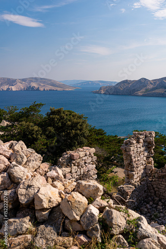 Fototapeta Naklejka Na Ścianę i Meble -  Aerial view of Adriatic Sea in Baska, Krk Island, Croatia. Sea passage between Krk Island and Prvic Island.