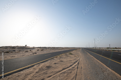 Hot desert landscape of Dubai at sunset