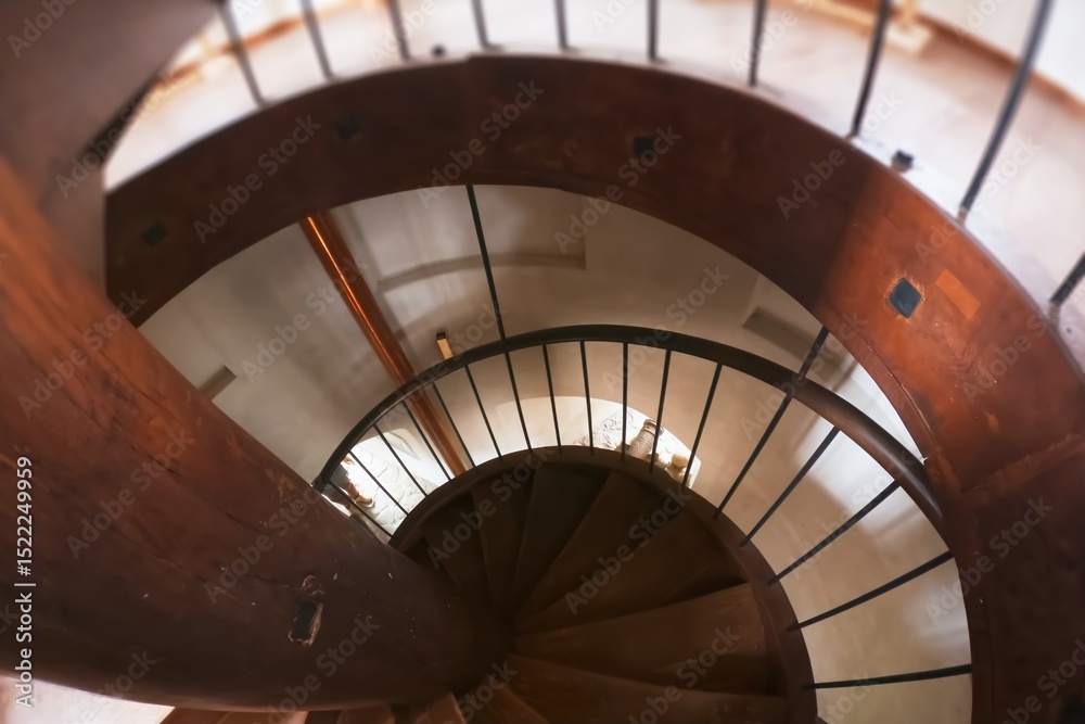 Fototapeta premium Spiral staircase in an old building,