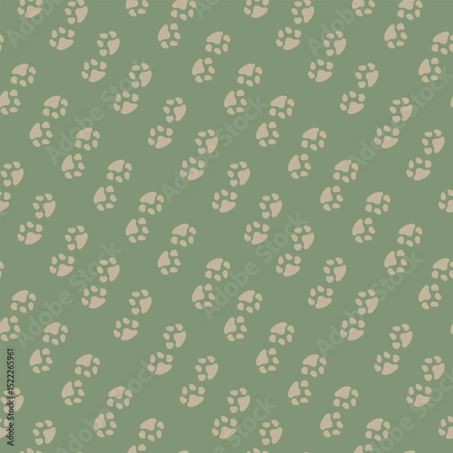 Seamless vector pattern of small, charming light brown paw prints in neutral colors on a solid green background, giving it a modern look. Perfect for pet-themed designs and children's decor.