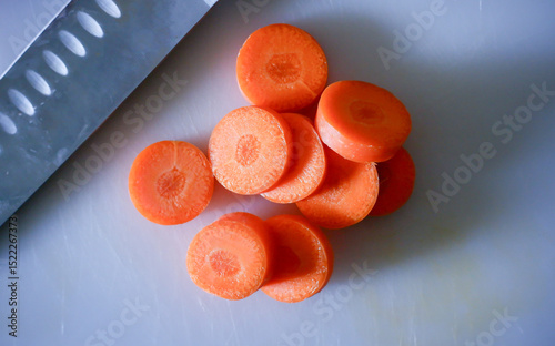 sliced carrots on a cutting board