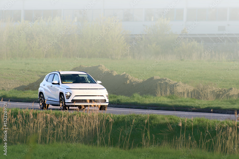 Fototapeta premium Electric SUV on open highway
