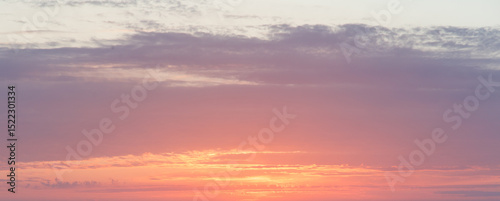 A beautiful sunset with a pink and purple sky