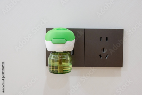 Electric mosquito repellent liquid on the socket