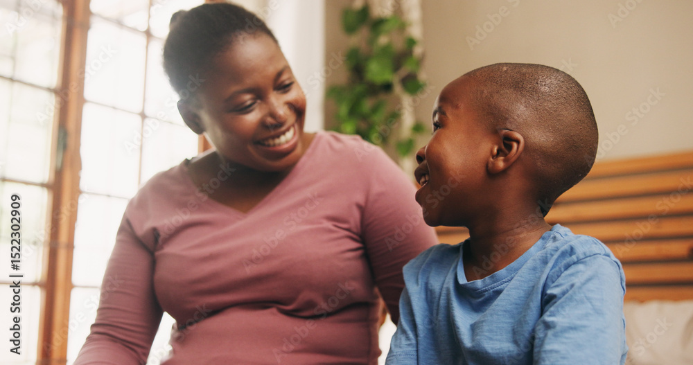 Obraz premium Home, black family and mother with boy, conversation and bonding together in bedroom. African parent, mama and son with discussion, smile and happiness with love, chatting and break with child