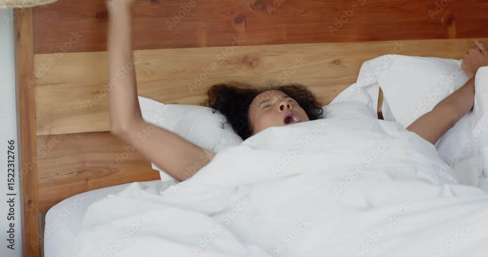 Relaxing in bed, thoughtful woman lying under white sheets, enjoying morning, at home
