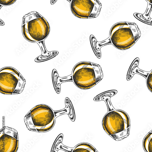 Seamless pattern with hand drawn vintage brandy or wine glasses in engraving style with yellow color