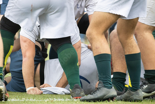Rugby players competing for the ball during a ruck