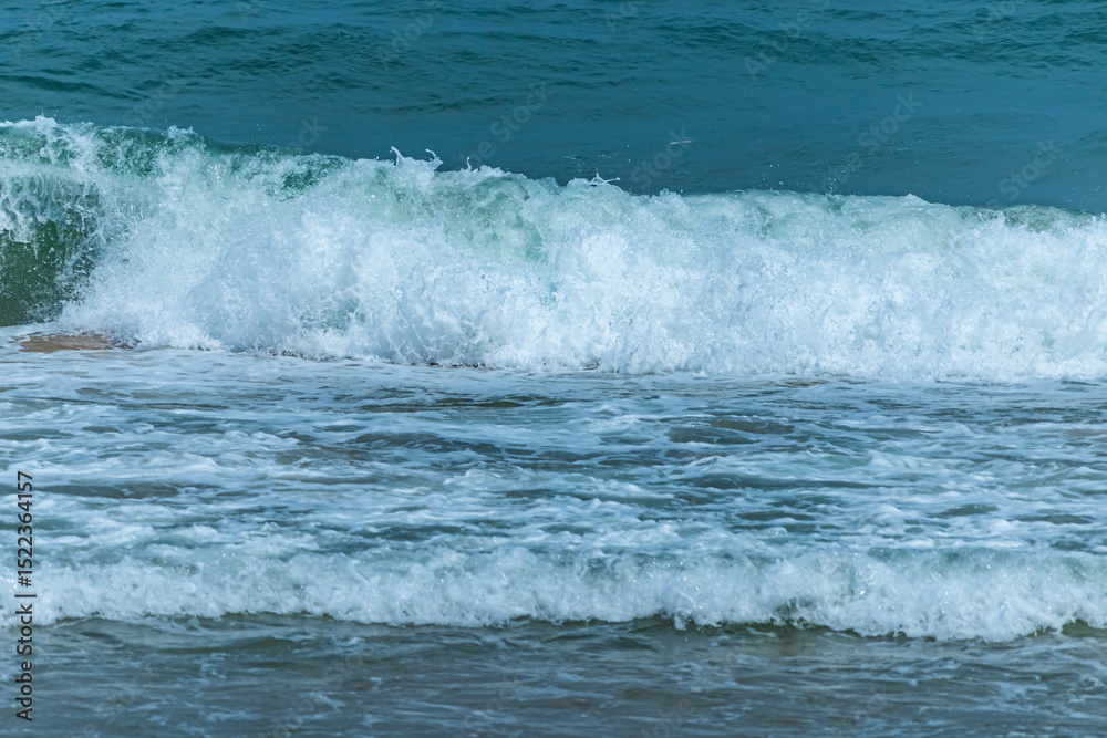 Fototapeta premium The blue sea on the beach