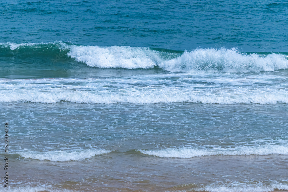 Fototapeta premium The blue sea on the beach