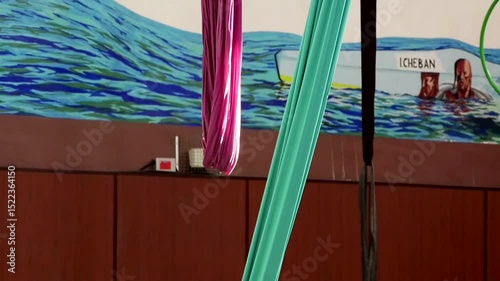 Purple and aquamarine fabrics for aerial gymnastics	

